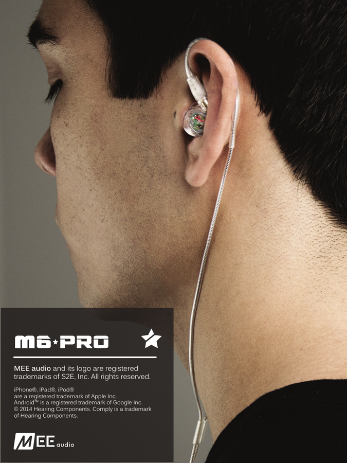 Person wearing the M6 PRO in-ear monitors, showing the correct over-the-ear fit with the memory wire secured behind the ear and the cable running down.