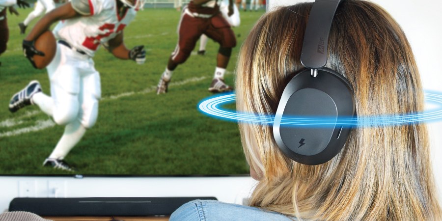 Woman watching football wearing Matrix Cinema 3D with 3D Sound